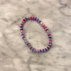 Kid’s size, purple and pink bracelet.